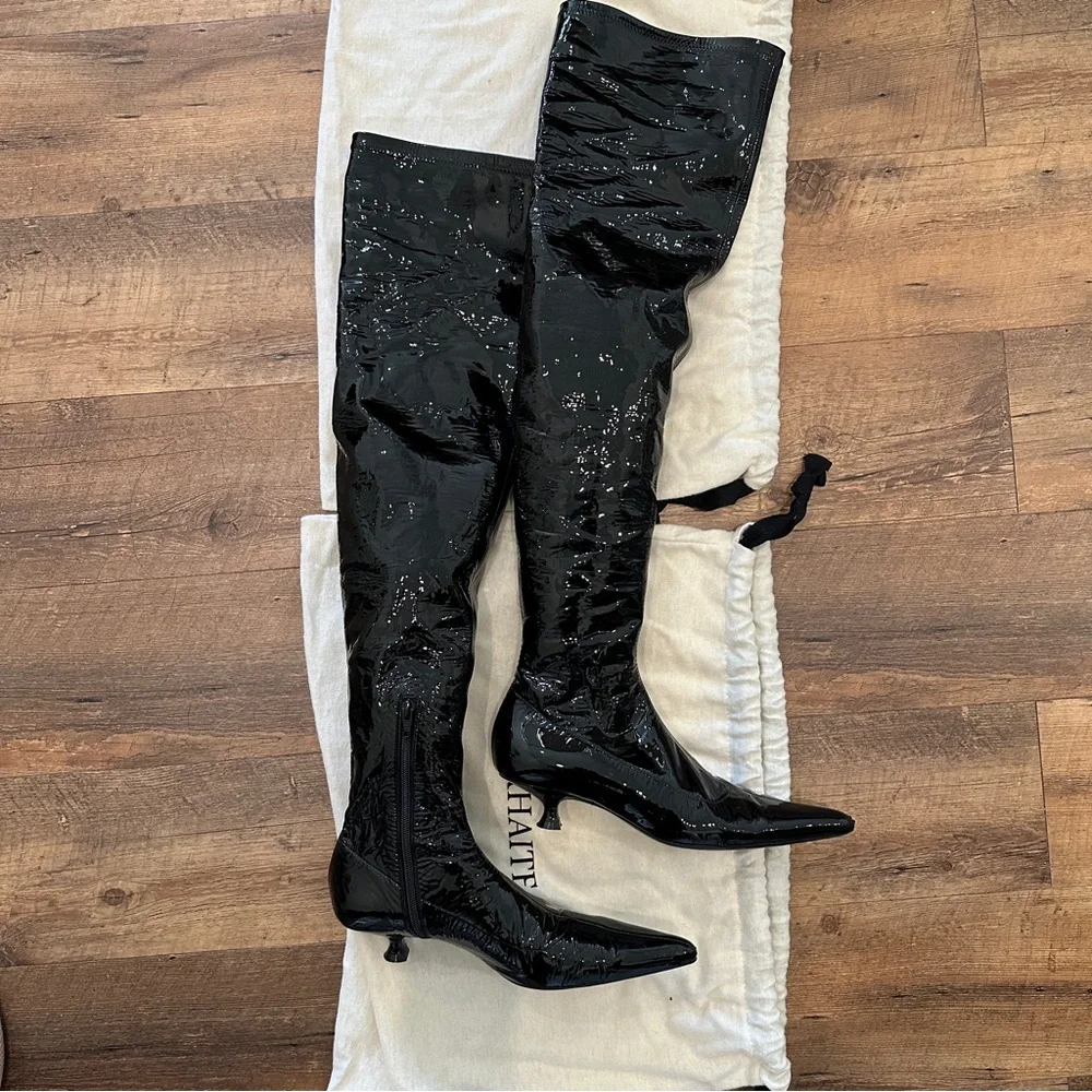 Khaite patent leather knee high boots